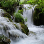 Waterfall at Plitvice National Park, Croatia. Water flowing along trail hike in Krka | www.switchbackstrategy.com