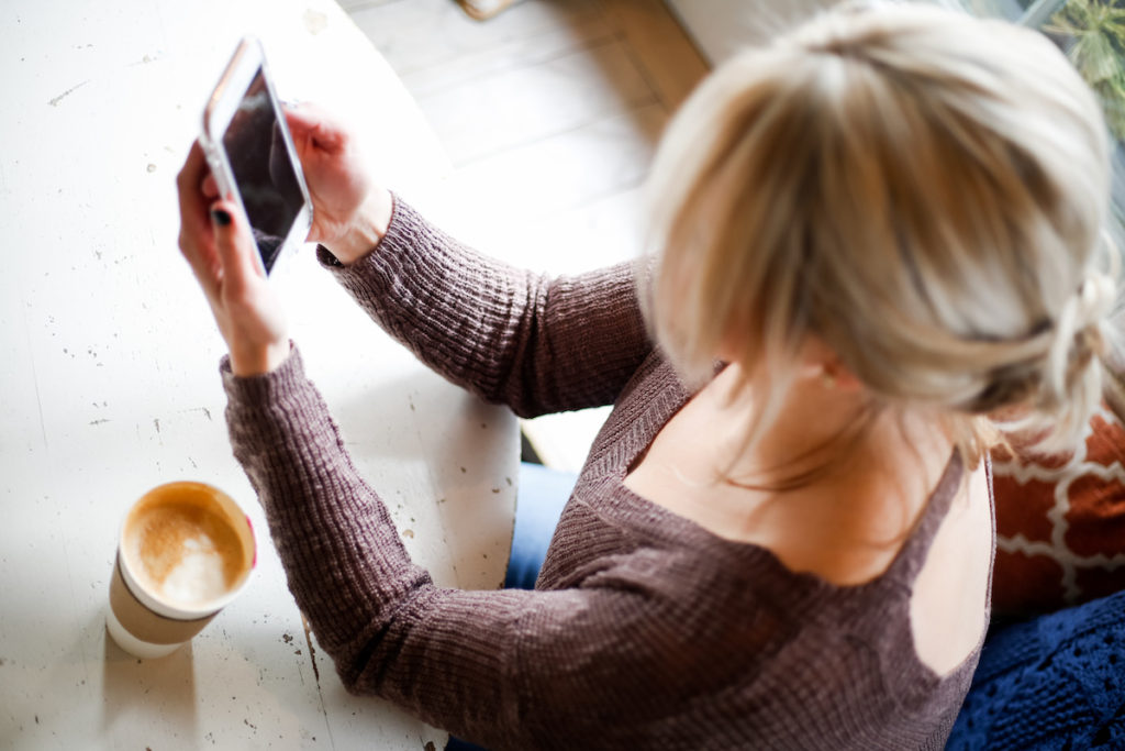 Lady looking at her iphone